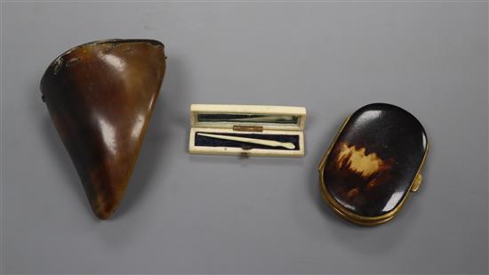 An ivory toothpick case, a small tortoiseshell purse, and a horn and brass snuff box